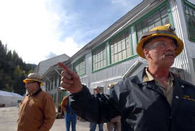
Longtime miner Joe Guardipee, right, leads a tour Saturday  at the Sunshine Mine. The mine, now owned by Sterling Mining, is set to reopen and be in production by December. 
 (Jesse Tinsley / The Spokesman-Review)