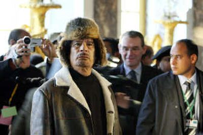 
Libyan leader Col. Moammar Gadhafi visits the Chateau de Versailles southwest of Paris on Friday during his ongoing visit to France. Associated Press
 (Associated Press / The Spokesman-Review)