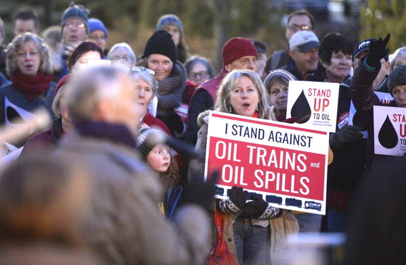 A crowd of approximately 200 people rally against oil train outside the Centerplace building, the location of a meeting about oil trains Thursday. (Jesse Tinsley / The Spokesman-Review)