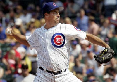 
Greg Maddux figures he is approaching 3,000 strikeouts because of his longevity. 
 (Associated Press / The Spokesman-Review)