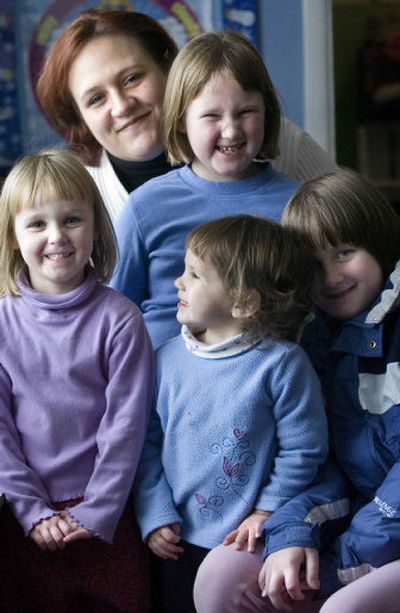 Jennifer Starkweather and her family were helped by the Martin Luther King Jr. Family Outreach Center, now in danger of closing because of budget cuts at the state's Children's Administration. Pictured are, clockwise from top left, Starkweather and her children 6-year-old Myla, 9-year-old Savauna, 2-year-old Lakaiya and 4-year-old Kienna Hutchinson.
(Holly Pickett / The Spokesman-Review)
