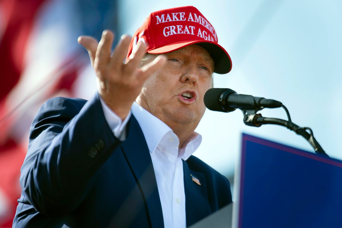 FILE — Former President Donald Trump speaks from the podium during a campaign rally, May 1, 2022, in Greenwood, Neb. A lawyer for the New York attorney general