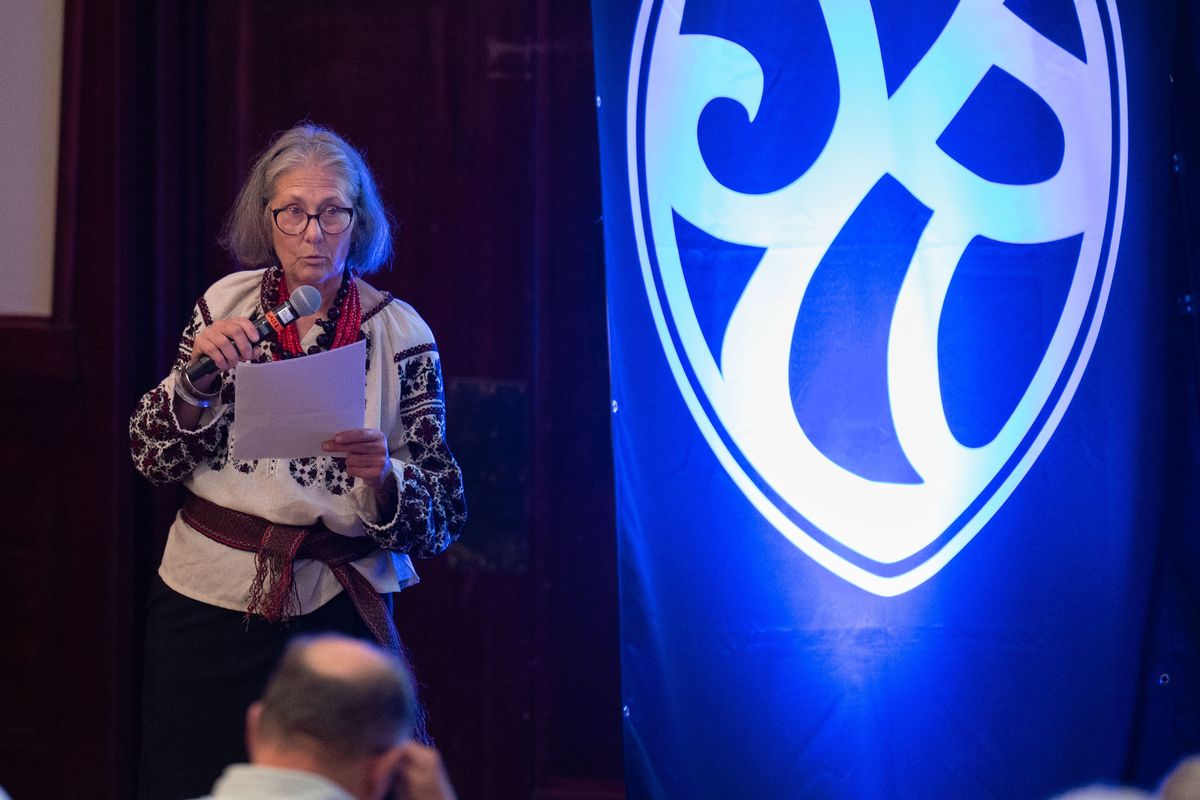 Christine Lysnewycz Holbert reads a Ukrainian poem before the start of Tuesday nightÕs Northwest Passage event with Spokesman-Review reporter Eli Francovich. Ukrainian literature wasnÕt on American readersÕ minds at all, but the war changed all of that. Holbert founded Lost Horse Press in 1998 and in 2017 as a tribute to her ancestors, established the Lost Horse Press Contemporary Ukrainian Poetry Series, which is edited by Grace Mahoney. There are now 10 books in the series, and Natalka BilotserkivetsÕ “Eccentric Days of Hope &amp; Sorrow,” translated by Ali Kinsella and Dzvinia Orlowsky, has been short-listed for the Griffin Prize for Poetry.  (COLIN MULVANY/THE SPOKESMAN-REVIEW)