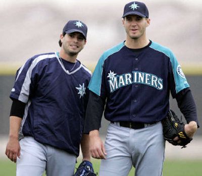 
Seattle pitchers Joel Pineiro, left, and Gil Meche are likely headed elsewhere next season.
 (Associated Press / The Spokesman-Review)