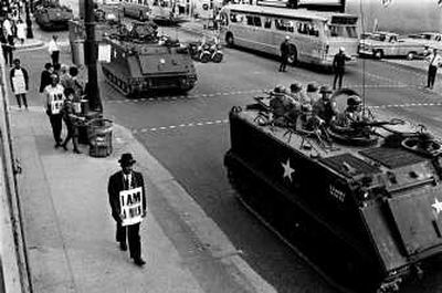Associated PressSanitation workers on strike in Memphis, Tenn., resume their daily marches on March 29, 1968, one day after the march led by Dr. Martin Luther King Jr. on Main and Beale Streets.
(FILE Associated Press / The Spokesman-Review)
