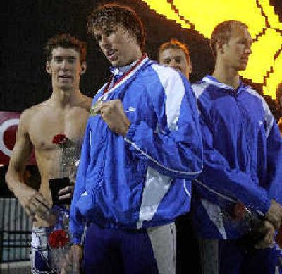 
From left, relay teammates Michael Phelps, Klete Keller, Peter Vanderkaay and Christian DeJong show off medals. 
 (Associated Press / The Spokesman-Review)