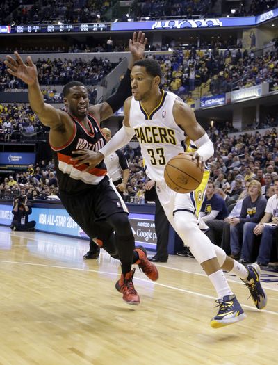 Indiana Pacers forward Danny Granger, right, drives on Portland Trail Blazers guard Wesley Matthews in the Pacers 118-113 victory. (Associated Press)