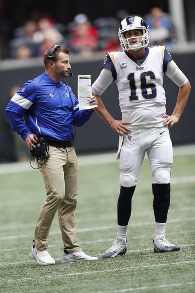 Los Angeles Rams head coach Sean McVay speaks to Los Angeles Rams quarterback Jared Goff (16) during the first half of an NFL football game against the Atlanta Falcons, Sunday, Oct. 20, 2019, in Atlanta. (John Bazemore / Associated Press)