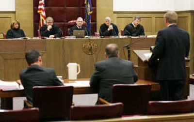 
Attorney Mitchell Brown, right, representing the Steed family, addresses the Idaho Supreme Court in Pocatello on Friday. Associated Press
 (Associated Press / The Spokesman-Review)