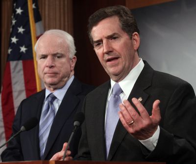 Sen. Jim DeMint, R-S.C., right, accompanied by Sen. John McCain, R-Ariz., gestures during a news conference on Capitol Hill in Washington, Thursday, Feb. 4, 2010, to discuss the introduction of legislation to enact a one-year earmark moratorium and a Balanced Budget Constitutional Amendment. (Lauren Burke / Fr132934 Ap)