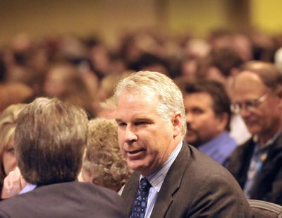 FILE – Then-Idaho state Rep. Phil Hart chats with other attendees while waiting for a speech by presidential candidate Ron Paul at the Spokane Convention Center on Feb. 21, 2012. (Jesse Tinsley / The Spokesman-Review)