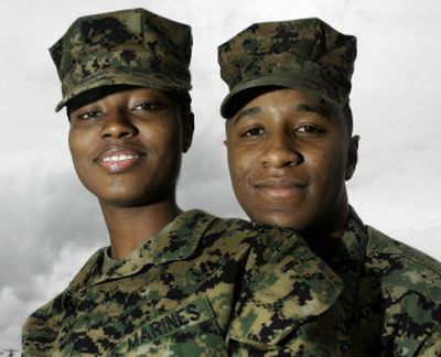 
U.S. Marines Kisha Pollard, left, and Michael Watts pose for a photo at Camp Pendleton Marine Base. Pollard and Watts are among a group of Marines that have recorded a rap album about Iraq titled 