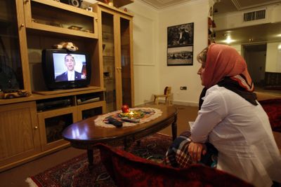 Marzieh Masaebi watches  President Barack Obama’s message  to the Iranian people, at her home in Tehran, Iran, on Friday.  (Associated Press / The Spokesman-Review)