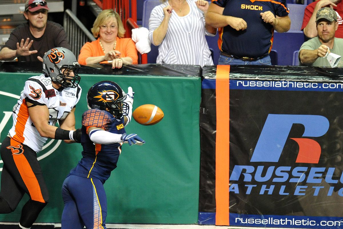 Spokane Shock defensive back Paul Stephens, right, knocks away a pass intended for Aaron Lesue of the Utah Blaze during the first half. (Tyler Tjomsland)