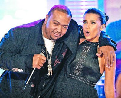 
Singers Nelly Furtado, right, and Timbaland perform during MTV's 