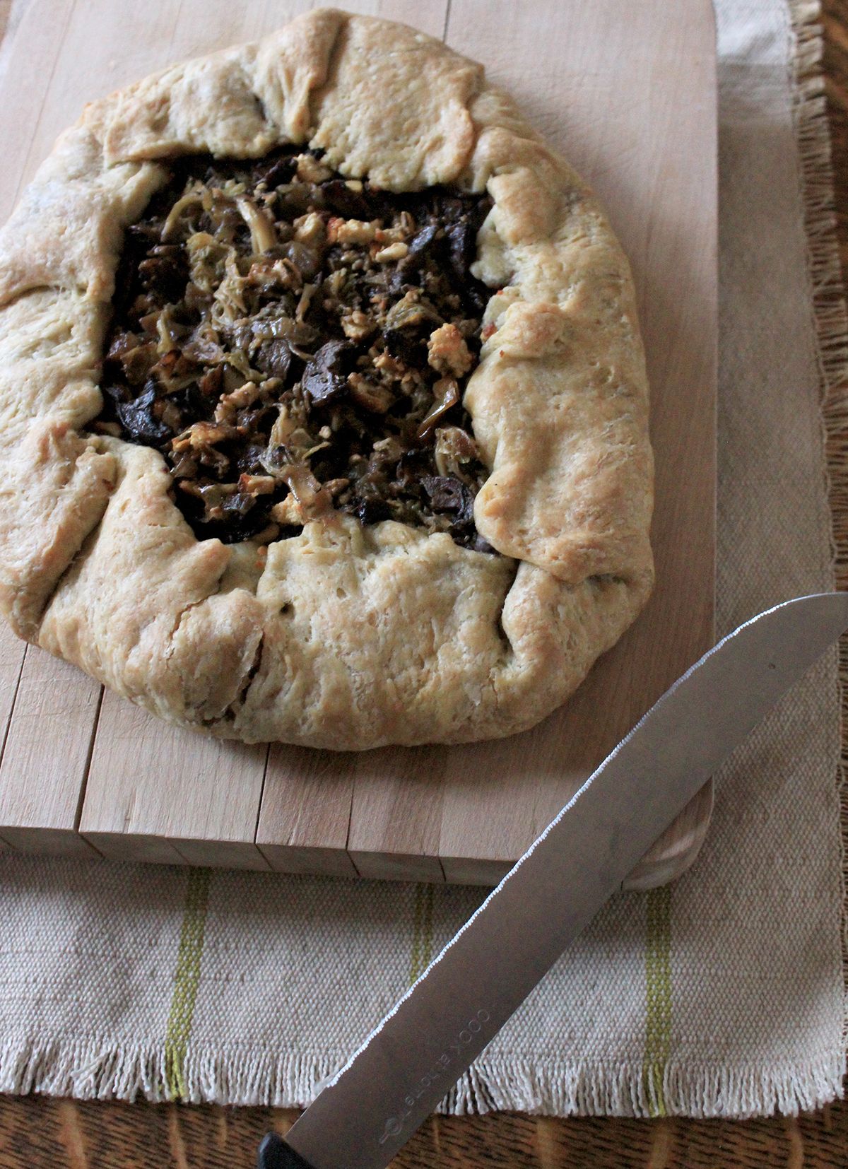 This rustic, vegetarian galette features caramelized cabbage, earthy mushrooms and salty queso fresco or feta, layered and wrapped in a rich, flaky crust. (Adriana Janovich)