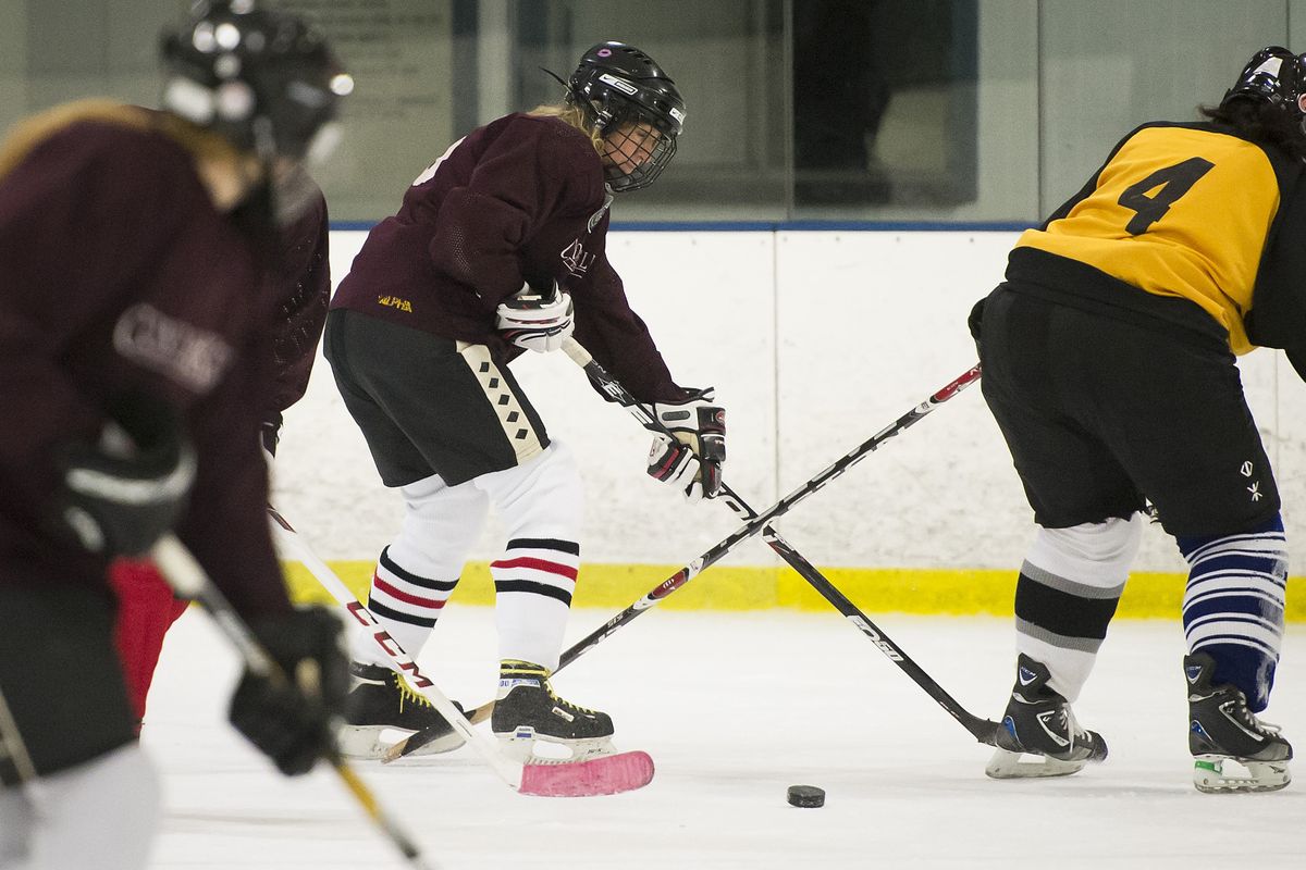 Merry Maccini, 59, a member of the Silver Skaters, competes in a Spokane Women's Hockey League game on Jan. 9.