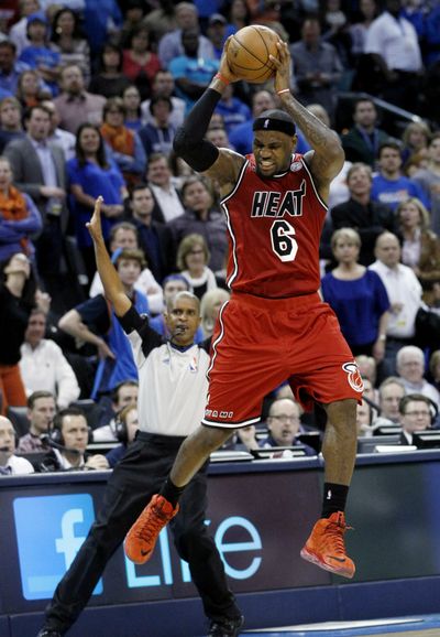 Heat’s LeBron James reacts to a whistle on him in the first half. (Associated Press)