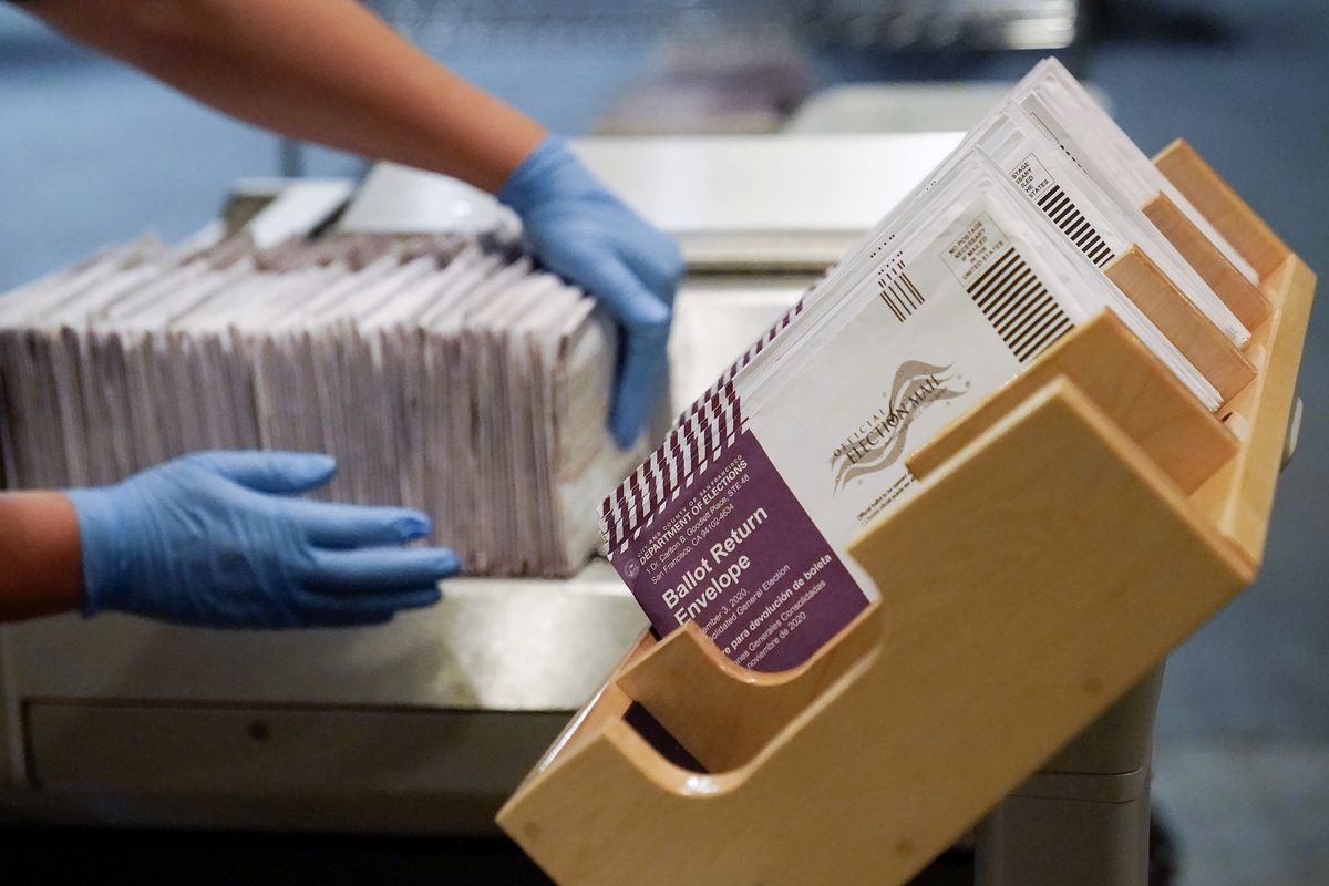 Envelopes containing ballots are shown at a San Francisco Department of Elections on Nov. 1.  (Jeff Chiu)