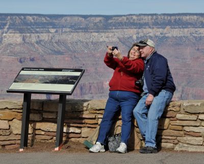 Tourists take a ‘selfie’ from the South Rim of Grand Canyon National Park. (Rich Landers / The Spokesman-Review)