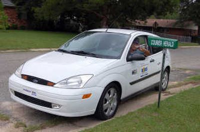 
An ethanol-powered car purchased by the Dublin, Ga. Courier-Herald newspaper is used for delivery by carrier Levi Rozier in Dublin, Ga. Associated Press
 (Associated Press / The Spokesman-Review)