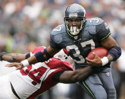 
Running back Shaun Alexander and the Seattle Seahawks need to dodge Arizona to win another division title. Associated Press
 (Associated Press / The Spokesman-Review)