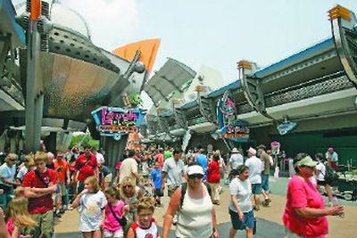 Guests walk by the entrance to the