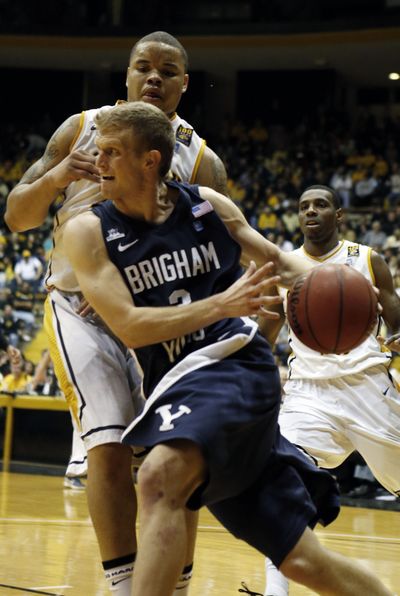 BYU’s Tyler Haws drives for two of his 25 points against Southern Miss. (Associated Press)