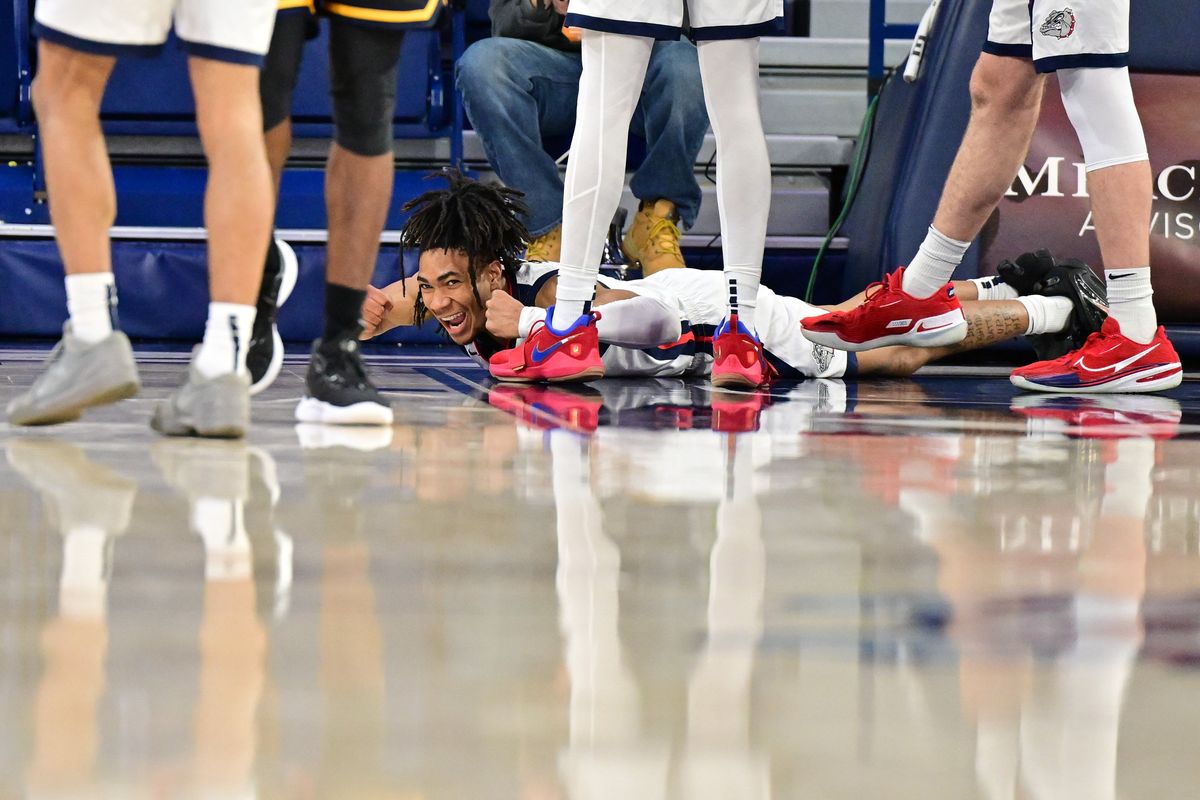 Gonzaga Bulldogs guard Hunter Sallis (5) reacts after landing on the floor while guarding the Kent State Golden Flashes during the second half of a college basketball game on Monday, Dec. 5, 2022, at McCarthey Athletic Center in Spokane, Wash. Gonzaga won game 73-66.  (Tyler Tjomsland/The Spokesman-Review)