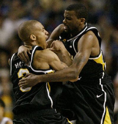 
VCU's Eric Maynor, left, celebrates victory over Duke with teammate Jamal Shuler.
 (Associated Press / The Spokesman-Review)