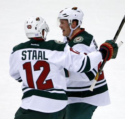 Minnesota Wild’s Ryan Suter, right, celebrates his goal with Eric Staal (12) during the first period of an NHL hockey game against the Pittsburgh Penguins in Pittsburgh, Thursday, Nov. 10, 2016. (Gene J. Puskar / Associated Press)