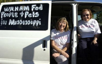 
Laura Sinnard-Swenson, left, and Mildred Staley are members of a group called WHHAM,  who filled two moving trucks with food and supplies and traveled to Mississippi to distribute the goods. 
 (Holly Pickett / The Spokesman-Review)