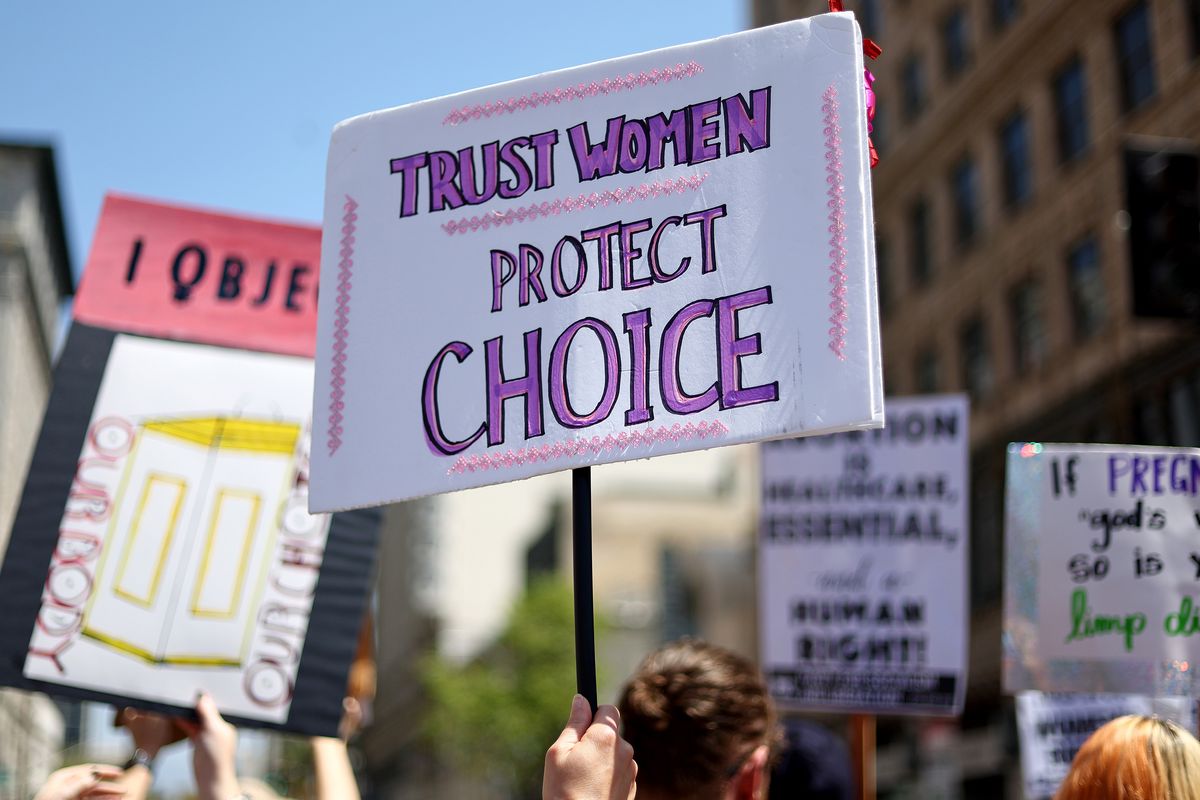Protestors demonstrate at the March for Reproductive Rights organized by Women