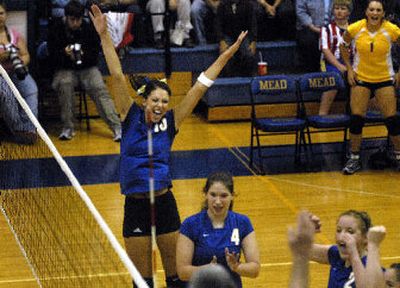 
Mead's Emma Olgard (10), celebrates point against Mt. Spokane, as do Karyn Mockel (4) and Ashley Hutchinson (2). 
 (Jed Conklin / The Spokesman-Review)