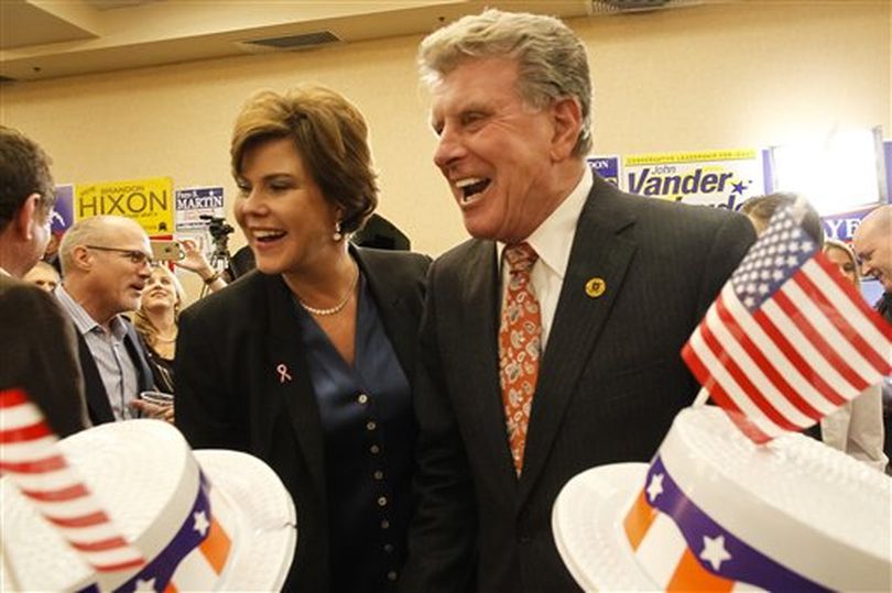 Idaho Gov. Butch Otter, with wife Lori, celebrates on election night in Boise (AP / Otto Kitsinger)