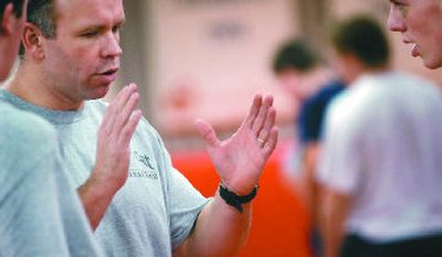 
Sandpoint wrestling coach Mike Randles isn't buying the favorite tag but knows Bulldogs will be in the hunt. 
 (Kathy Plonka / The Spokesman-Review)