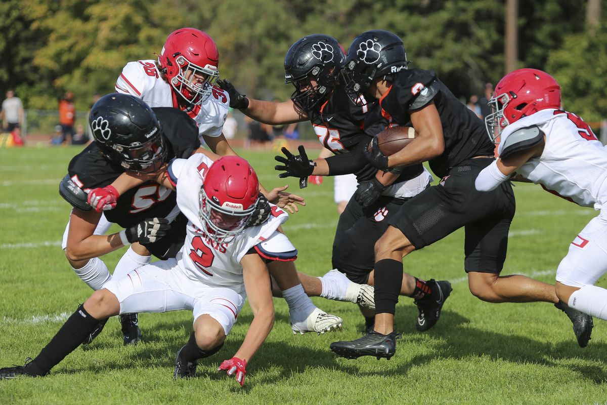 Lewis and Clark’s Caleb Kostecka carried for 122 yards and a score against Ferris on Friday as LC played a home game at Hart Field for the first time since November 1969. Lewis and Clark won the Greater Spokane League game 40-6.  (Cheryl Nichols Photography LLC)