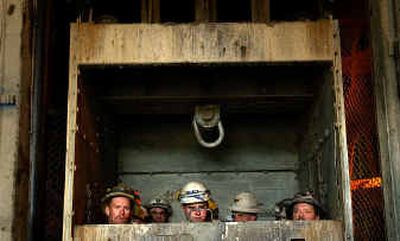 
Miners descend into the Lucky Friday mine at Mullan, Idaho, at the start of their shift on Monday afternoon. 
 (Brian Plonka / The Spokesman-Review)