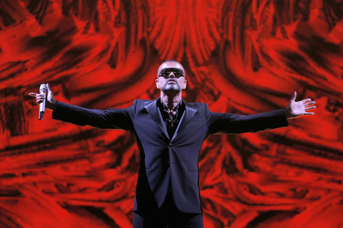 FILE - In this Sept. 9, 2012 file photo, British singer George Michael performs at a concert to raise money for the AIDS charity Sidaction, during the Symphonica tour at Palais Garnier Opera house in Paris, France. Michael, who rocketed to stardom with WHAM! and went on to enjoy a long and celebrated solo career lined with controversies, has died, his publicist said Sunday, Dec. 25, 2016. He was 53. (Francois Mori / Associated Press)