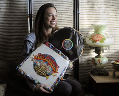 Spokane artist Lisa Allen incorporates vinyl record albums and their covers into her custom-made purses. (Dan Pelle)