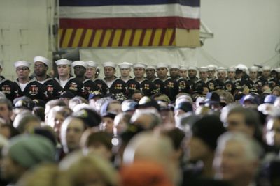 Seattle Times U.S. Navy attend a ceremony for the USS Kitty Hawk at Naval Base Kitsap in Bremerton on Saturday. (Courtney Blethen Seattle Times / The Spokesman-Review)