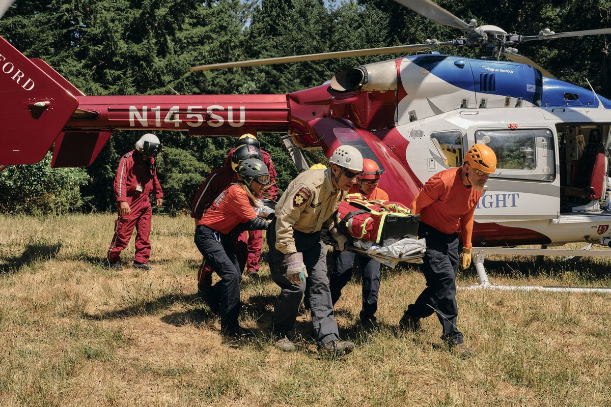 Members of Stanford Life Flight conduct a multiagency landing zone orientation in Kings Mountain, Calif., on Saturday. MUST CREDIT: Philip Cheung for The Washington Post  (Philip Cheung/For The Washington Post)