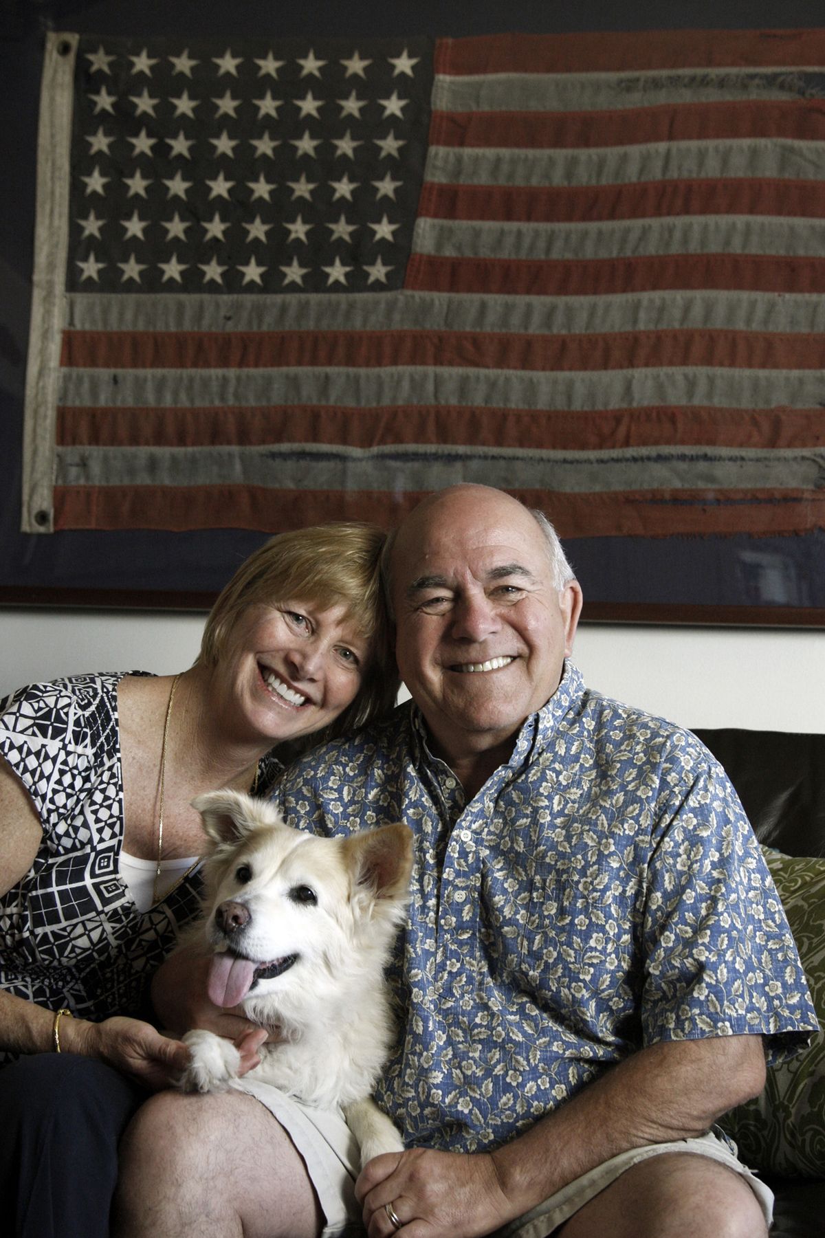 Susie Martin and Patrick Webster relax at their home in Redondo Beach, Calif. Webster, who makes $80,000 a year as a professor, held two jobs for 18 years.