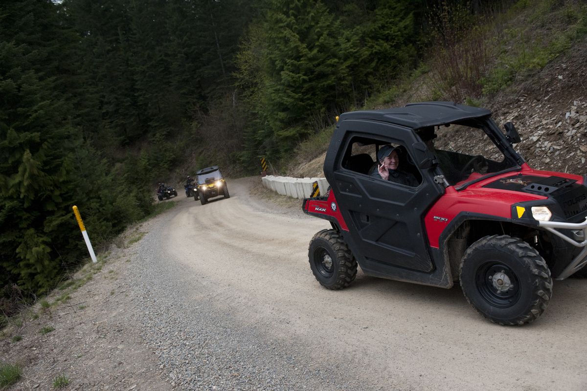 Members of the Backcountry ATV Association head out on a trail during last Saturday’s gathering at Fourth of July Pass near Coeur d’Alene. (TYLER TJOMSLAND PHOTOS)