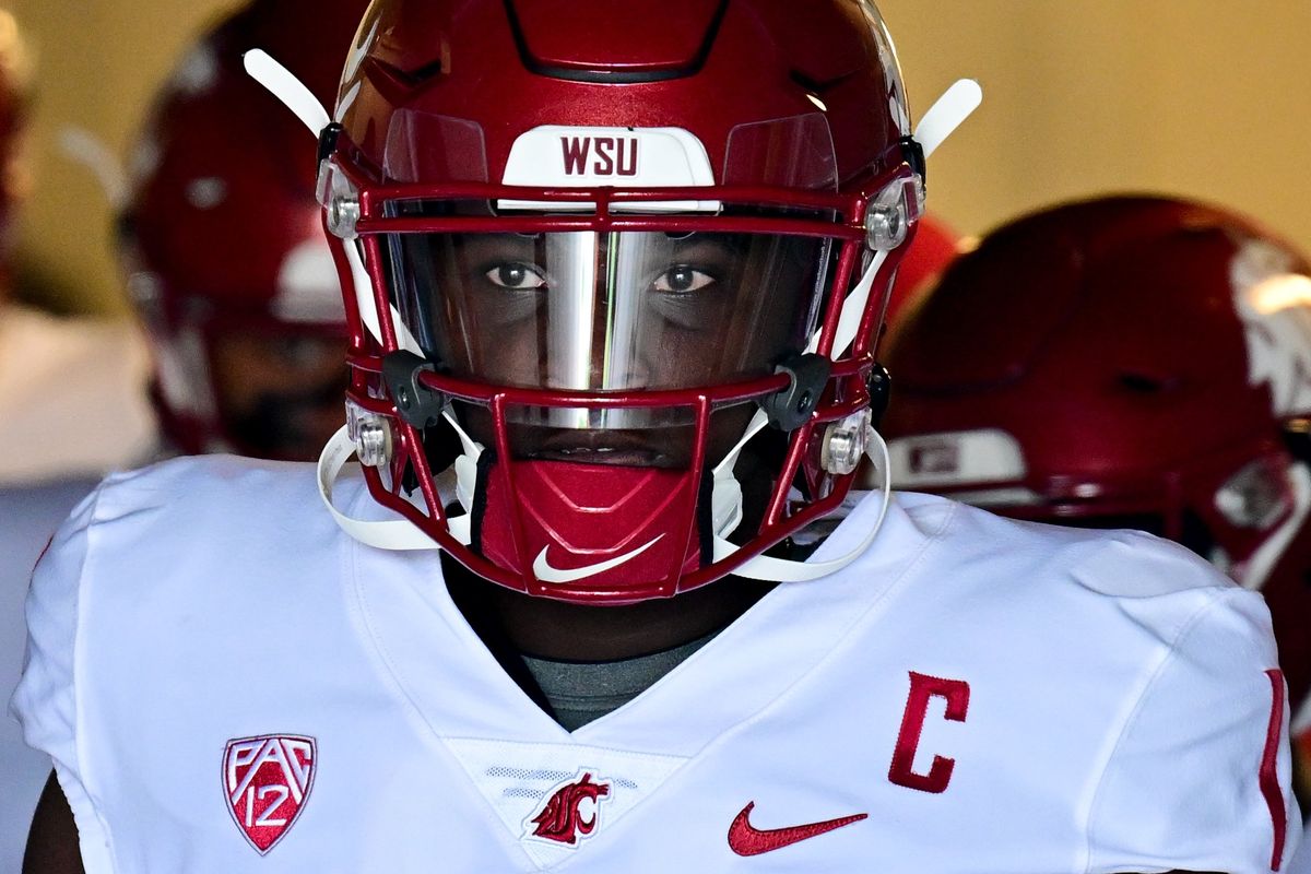 Washington State quarterback Cameron Ward eyes the field before the Cougars’ season-opening 50-24 win over Colorado State in Fort Collins, Colo.  (Tyler Tjomsland/The Spokesman-Review)