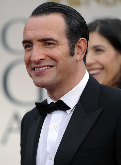 “The Artist” star Jean Dujardin arrives at the Golden Globes in L.A. (Associated Press)