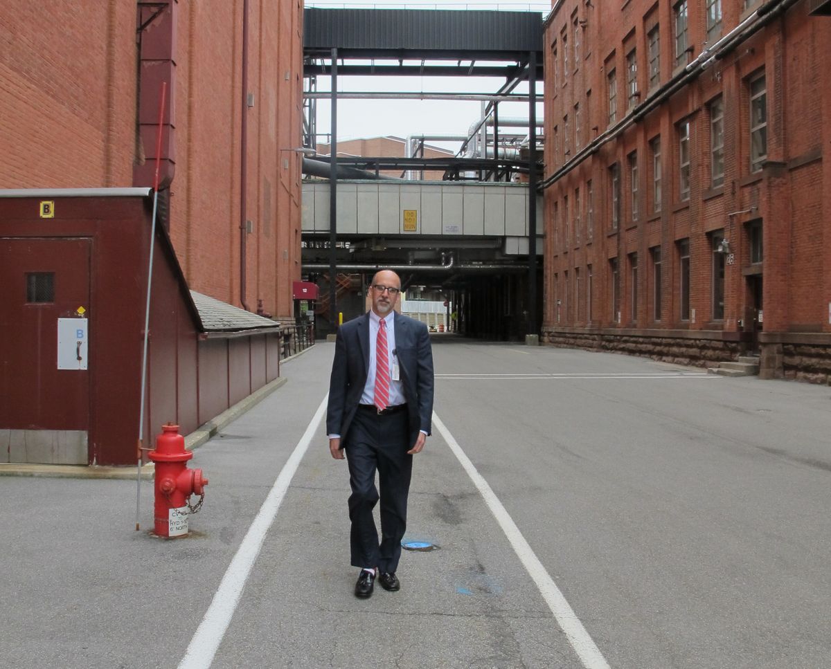Michael Alt, director of Eastman Business Park, walks between buildings on the Eastman Business Park campus in Rochester, N.Y. (Associated Press)