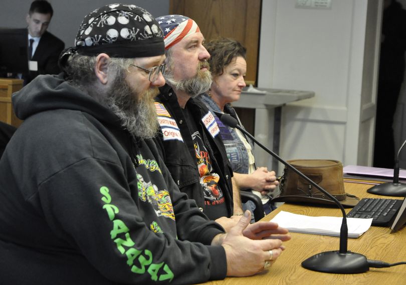 OLYMPIA -- Joe Sullivan (left), Keith Parkison and Rachel Ahola, Members of the motorcyclists' rights group ABATE ask the Senate Transportation Committee to make wearing a helmet optional. (Jim Camden/The Spokesman-Review)