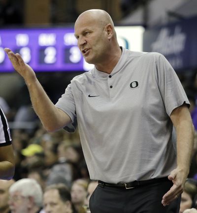 In this Jan. 27  photo, Oregon head coach Kelly Graves talks with an official during a  game against Washington in Seattle. Oregon will face Baylor in a Final Four semifinal on Friday. (Elaine Thompson / AP)