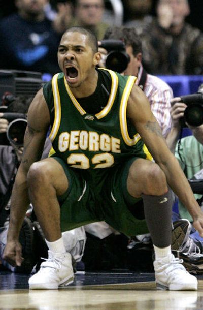 
Lamar Butler shows his enthusiasm during George Mason's win over Connecticut that put the Patriots into the Final Four. 
 (Associated Press / The Spokesman-Review)